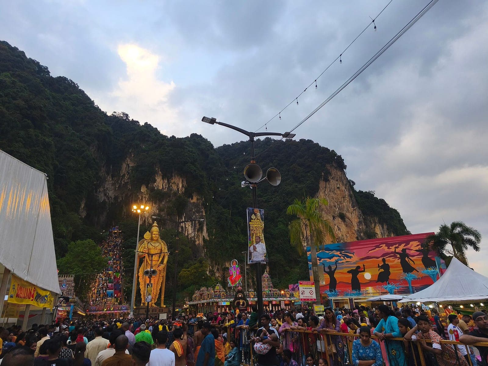 The illuminated steps and statue at Batu Caves