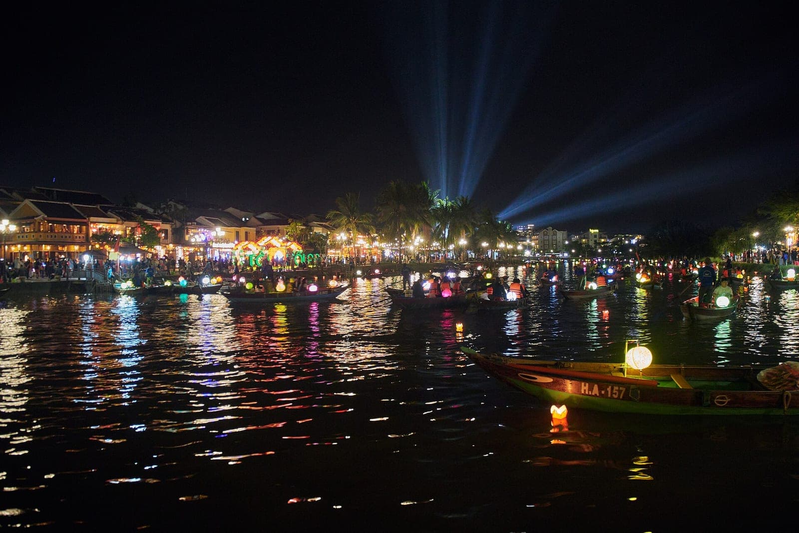 Lights reflected in Hoi An’s river at night