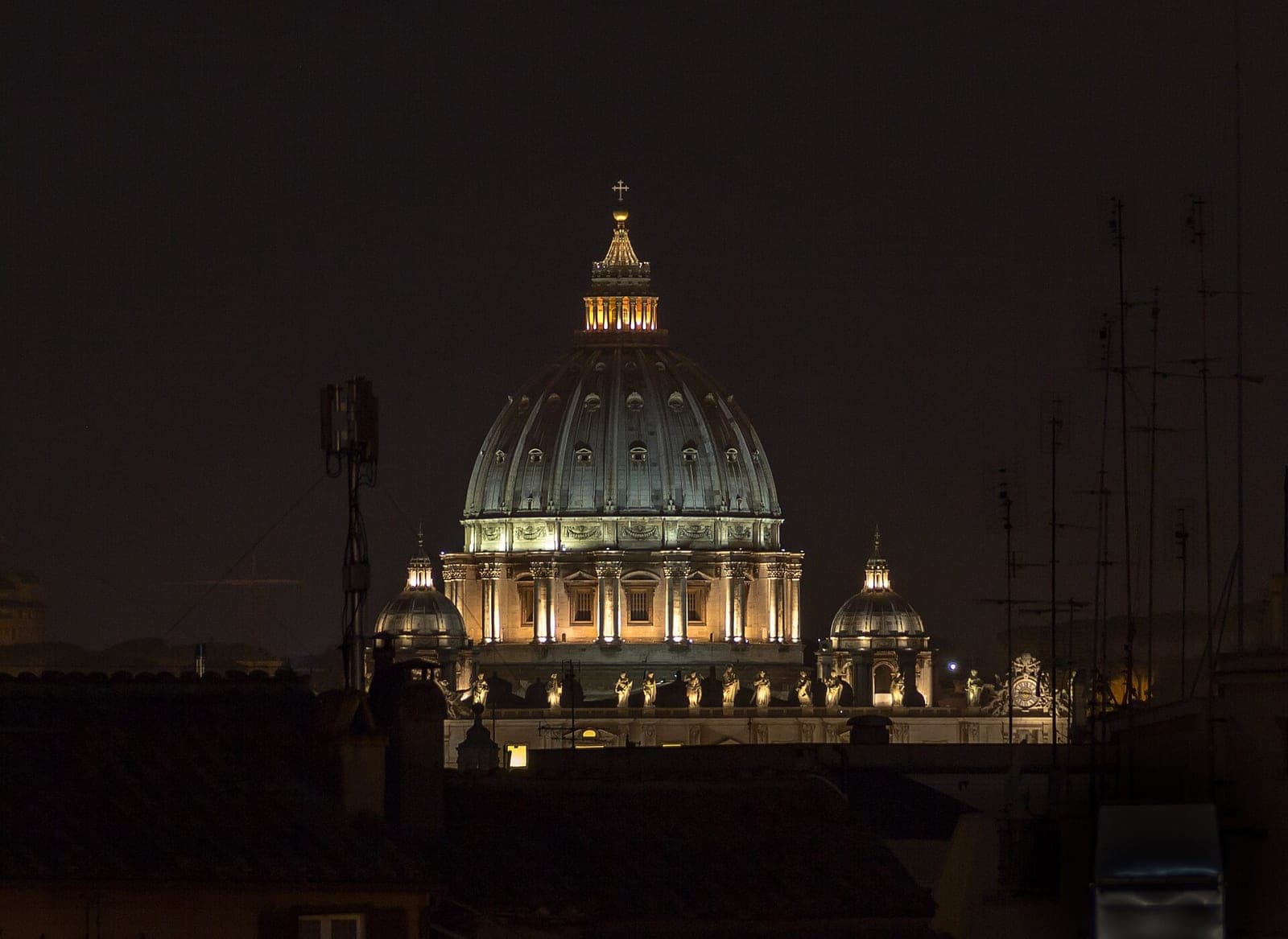 The illuminated dome of Saint Peter’s Basilica